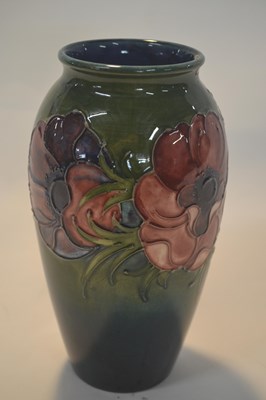 Lot 260 - Moorcroft vase with Anemone pattern on green...
