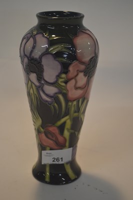 Lot 261 - A Moorcroft vase with tubelined floral...