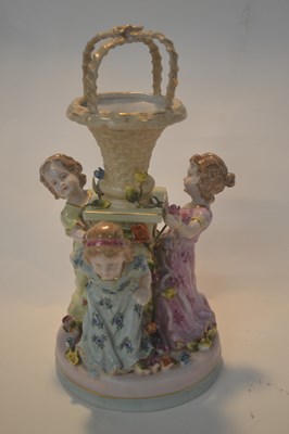 Lot 272 - A continental porcelain centrepiece with three...