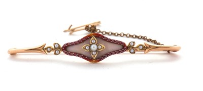 Lot 147A - A 15c enamel and seed pearl brooch, the...
