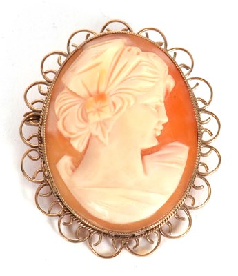 Lot 195A - A 9ct cameo brooch, the oval shell cameo in...