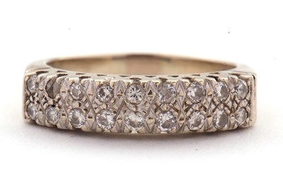 Lot 77A - An 18ct diamond ring, set with two rows of...