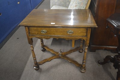 Lot 433 - A 20th Century oak side table in the 18th...
