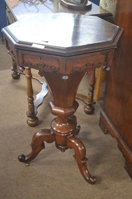 Lot 434 - A Victorian sewing table with octagonal hinged...