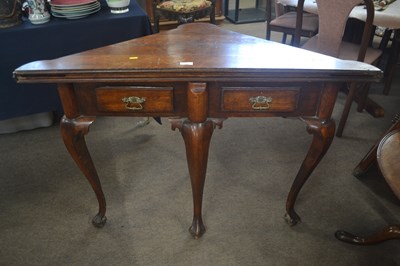 Lot 444 - An unusual Georgian oak triangular games table...