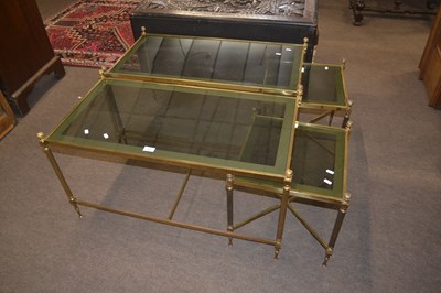 Lot 447 - A nest of three mid 20th Century brass framed...