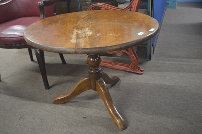 Lot 486 - A hardwood side table on turned column with...
