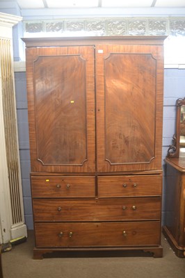 Lot 516 - A Georgian mahogany linen press with moulded...