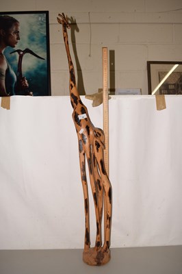 Lot 19 - A modern wooden model of a giraffe