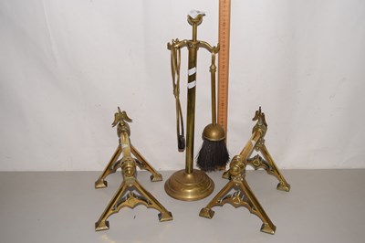 Lot 20 - A pair of brass fire dogs together with a fire...