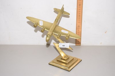 Lot 48 - An early 20th Century brass desk ornament...