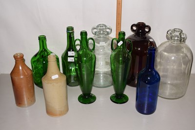 Lot 12 - Green glass jars, vases, two large glass...