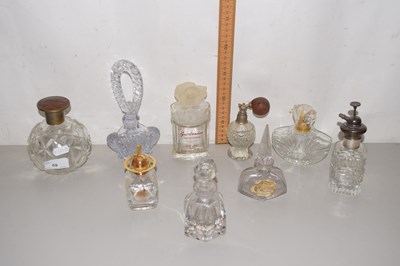Lot 59 - A collection of various glass scent bottles