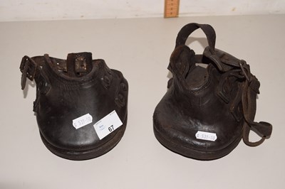Lot 67 - A pair of leather horse shoes