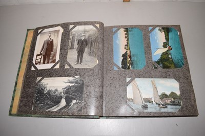 Lot 71 - An album of various postcards
