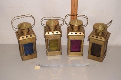 Lot 74 - A set of four brass lanterns