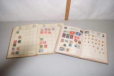 Lot 82 - Two junior stamp albums containing a range of...