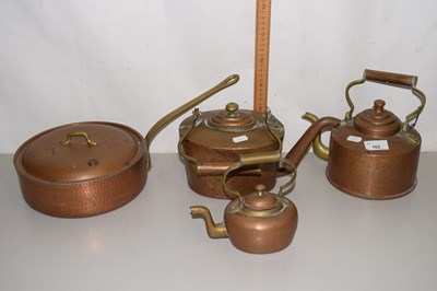 Lot 162 - A group of three copper kettles and a copper pan