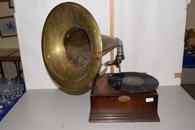 Lot 211 - A hardwood cased gramophone with grass horn,...