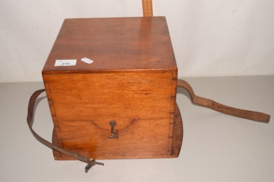 Lot 215 - A hardwood case with baize lining