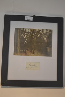 Lot 299 - A framed photograph of George V with signature...