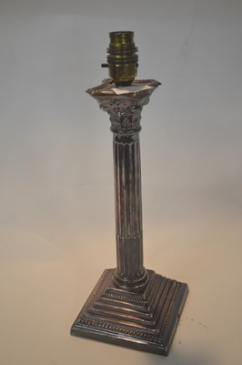Lot 303 - A white metal Corinthian column shaped base...