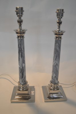 Lot 312 - Two table lamps with marble type columns on...