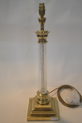 Lot 313 - A table lamp with glass wrythen shaped stem on...