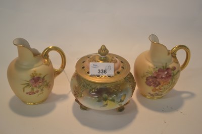 Lot 336 - Two small blush ground Royal Worcester jugs...