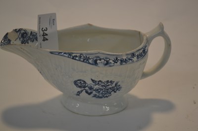 Lot 344 - A Lowestoft porcelain sauce boat, the fluted...