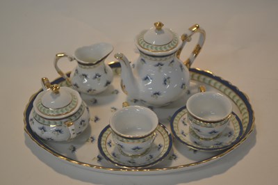 Lot 360 - A Regal porcelain miniature tea for two with...