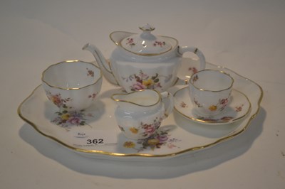 Lot 362 - A Royal Crown Derby posies miniature tea set...