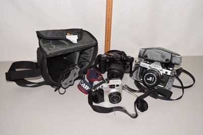 Lot 556 - A Canon EOS500 with a 35-80mm lens, a Canon A1...
