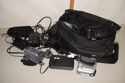 Lot 563 - A Nikon Coolpics 8600, a JVC cine camera,...