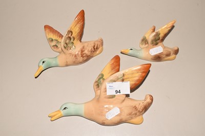 Lot 94 - A set of three pottery wall ducks