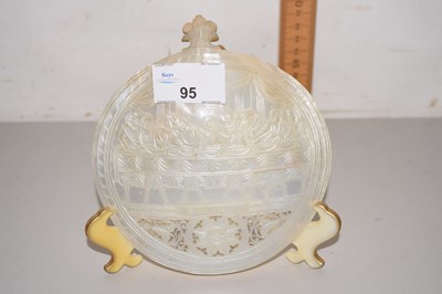 Lot 95 - A carved mother of pearl shell decorated with...