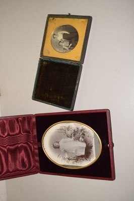 Lot 106 - Two cased black and white photographs