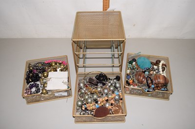 Lot 122 - Small three drawer cabinet containing assorted...
