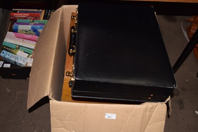 Lot 577 - A leather briefcase, storage boxes etc