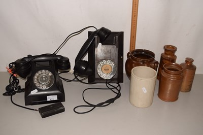 Lot 625 - Two vintage telephones and stone ware bottles