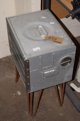 Lot 718 - An industrial style cupboard on stand