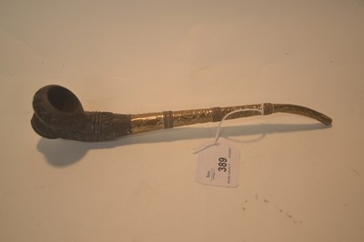 Lot 389 - Pipe with brass stem