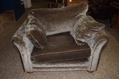 Lot 279 - A large modern velvet finish armchair