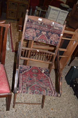 Lot 306 - A carpet covered folding chair