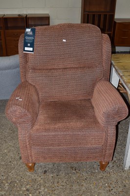 Lot 325 - An HSL wing back armchair