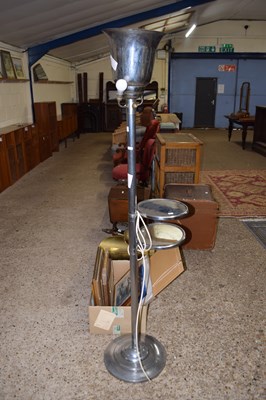 Lot 341 - A metal uplighter with two mirrored shelves