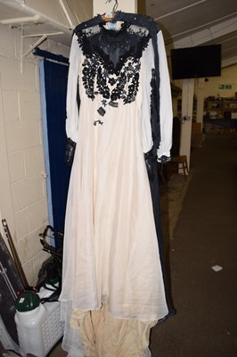 Lot 865 - Four full length and lace dresses