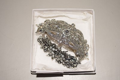 Lot 144 - Two costume jewellery hair clips