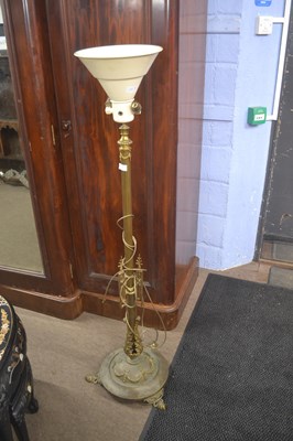 Lot 518 - A brass uplighter with column formed stem and...