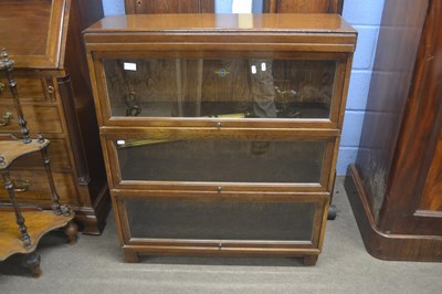 Lot 524 - A Globe Wernicke three tier stacking oak...